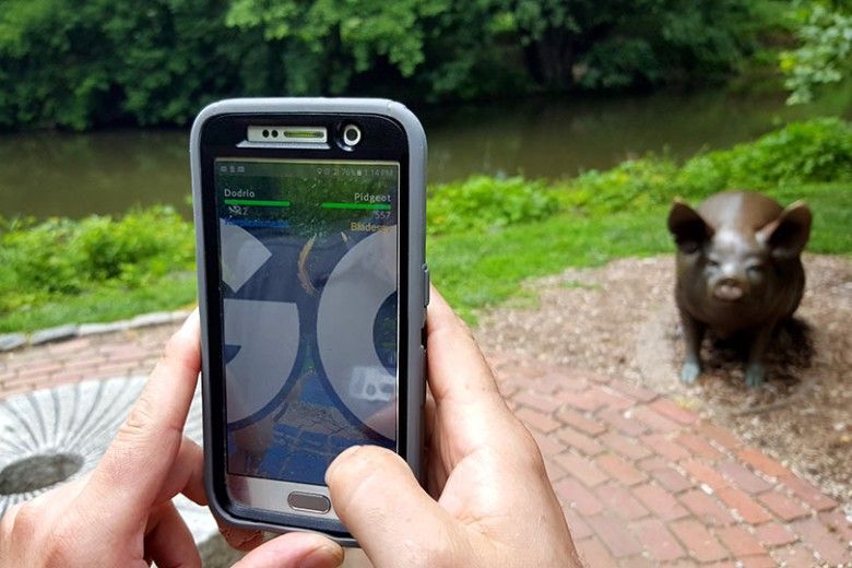 Playing Pokemon GO by the Brandywine River
