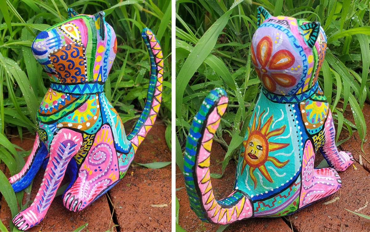 Front and back views of a painted sculpture