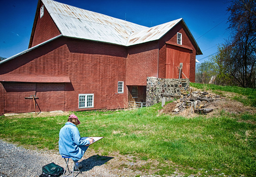 Woman painting at Keurner Farm.