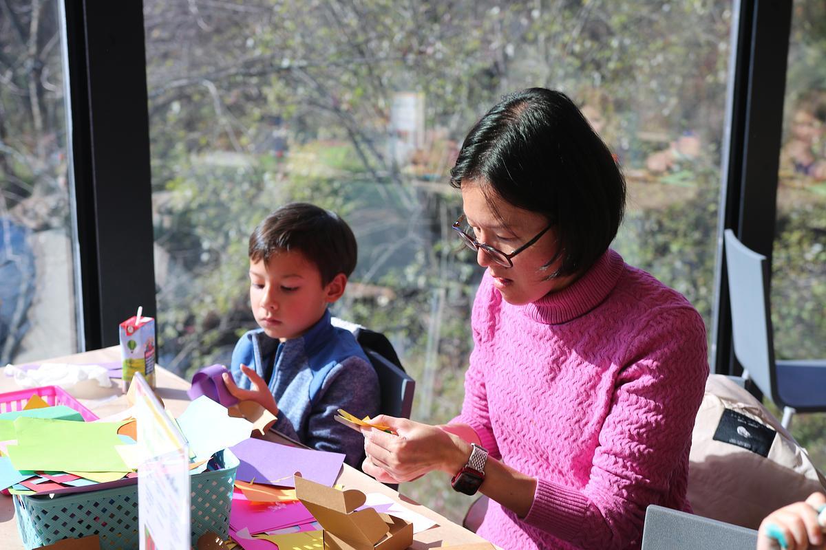 Mother and son working on an arts and crafts project