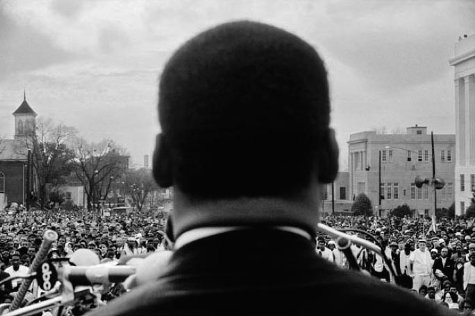 Dr. Martin Luther King, Jr. speaking to 25,000 civil rights marchers at conclusion of the Selma to Montgomery March.