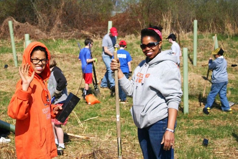 Woman and child at a tree planting