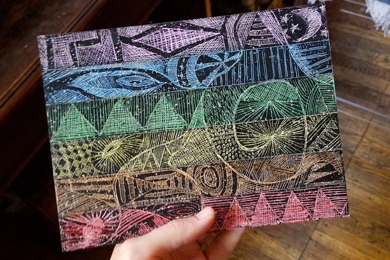Rainbow colored flag design made using scratch art