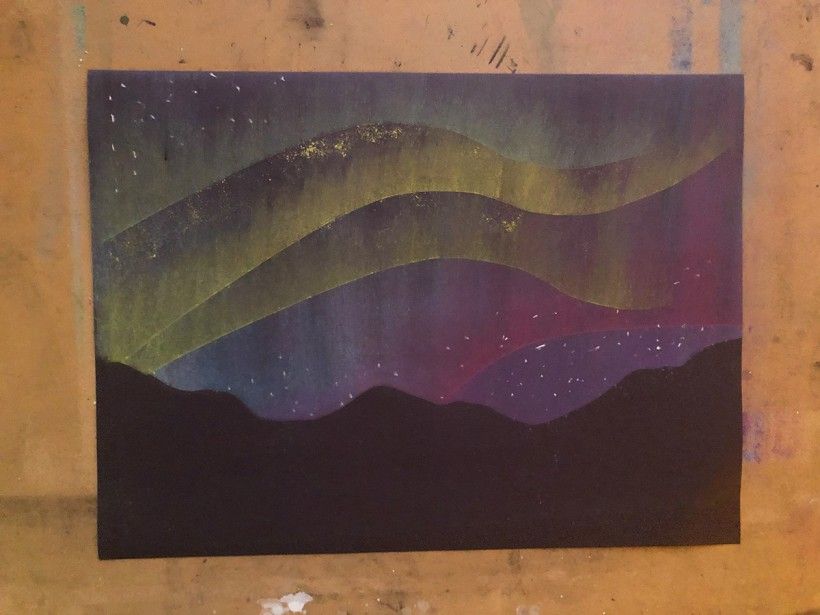 Final product: a northern lights scene created with chalk pastels