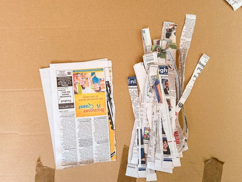 Cut up strips of newspaper