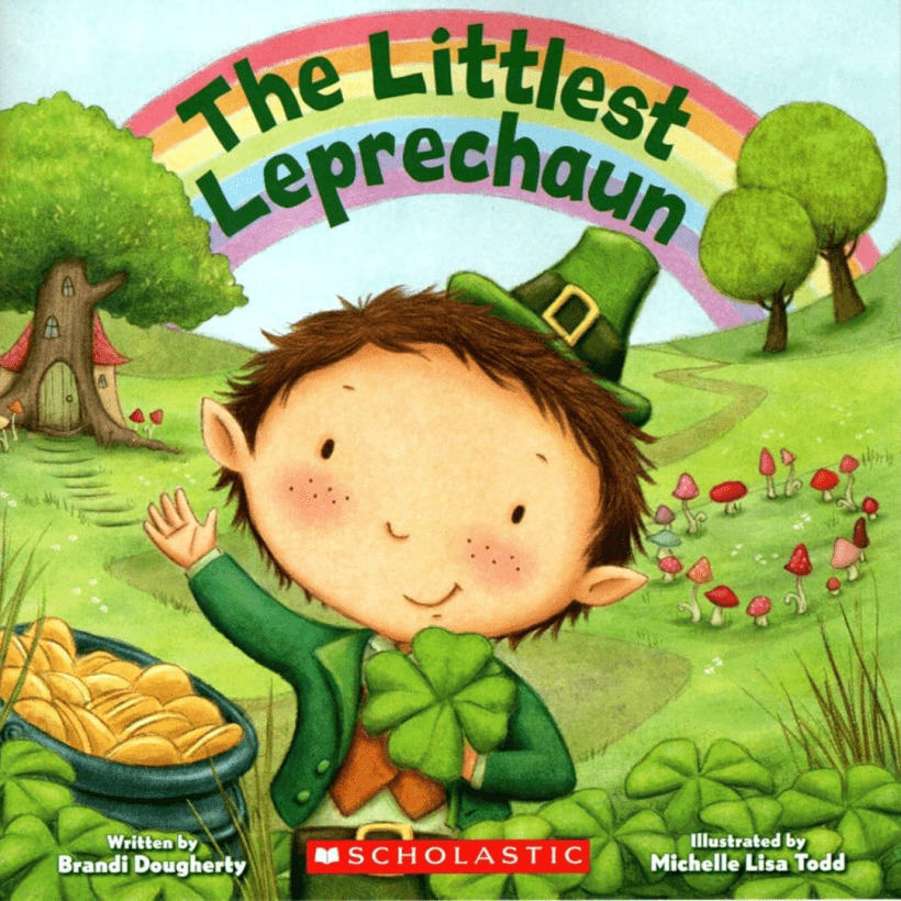A book cover of a leprechaun waving with a pot of gold sitting next to him in a green field with trees and flowers. A rainbow stretches across the book cover with text in green that reads "The Little Leprechaun" on top of it, with white text in the bottom corner that reads "By Brandi Dougherty".