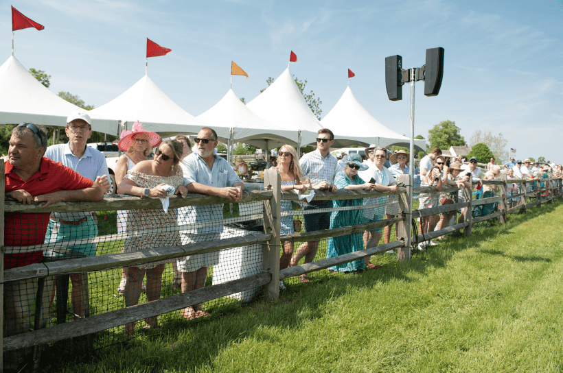 Photo by Bob Plant Crowd gathers on the home stretch to watch the Radnor Hunt Races.