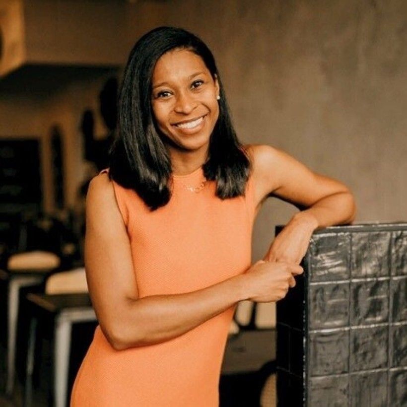 Photo of a woman in an orange dress