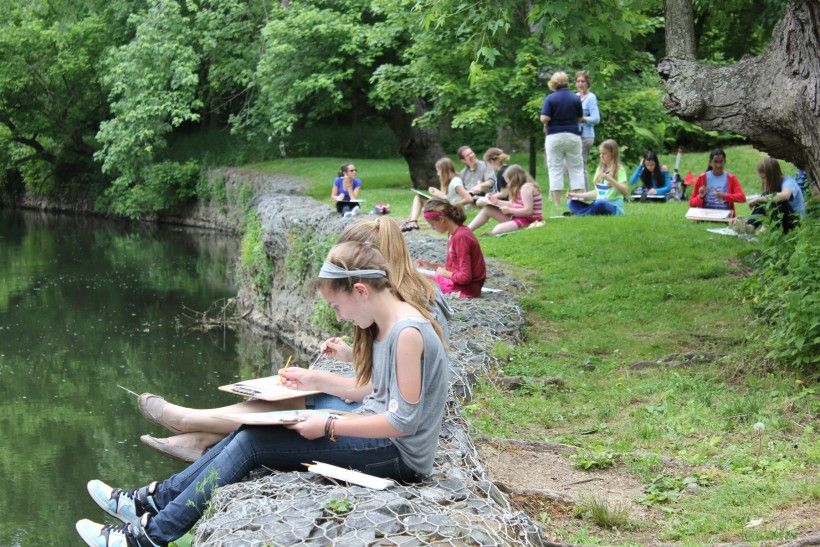 teens sketching along the Brandywine Creek