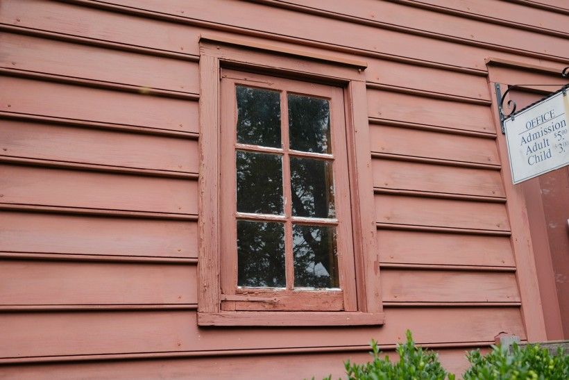 BEFORE photo of wood window restoration. Photo Credit: John Milner Architects, Inc.