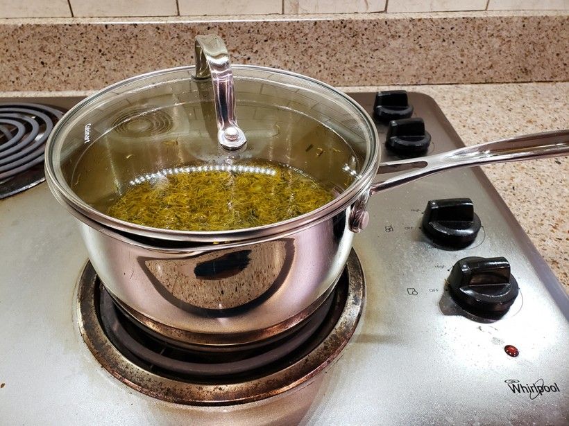 Dandelion water in a covered pot