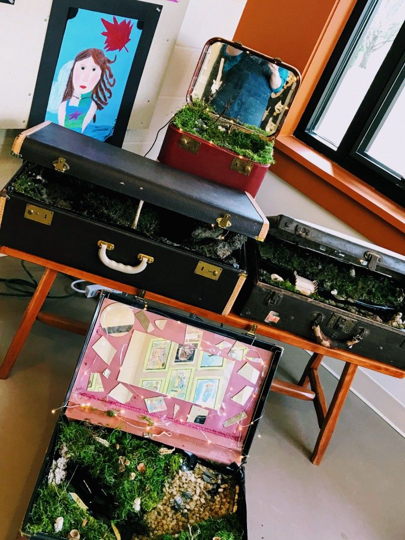 The students' finished trunks, complete with landscape features and running water. Photo by Liam Gallagher, Upland Country Day School.