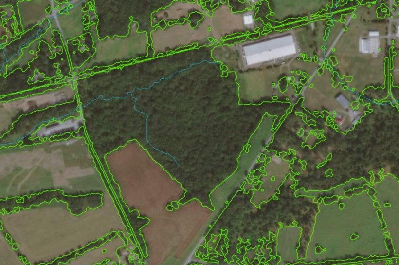 Recently acquired remote sensing data allows for accurate woodland delineation as shown by the green outline in this image. Recently acquired remote sensing data allows for accurate woodland delineation as shown by the green outline in this image.
