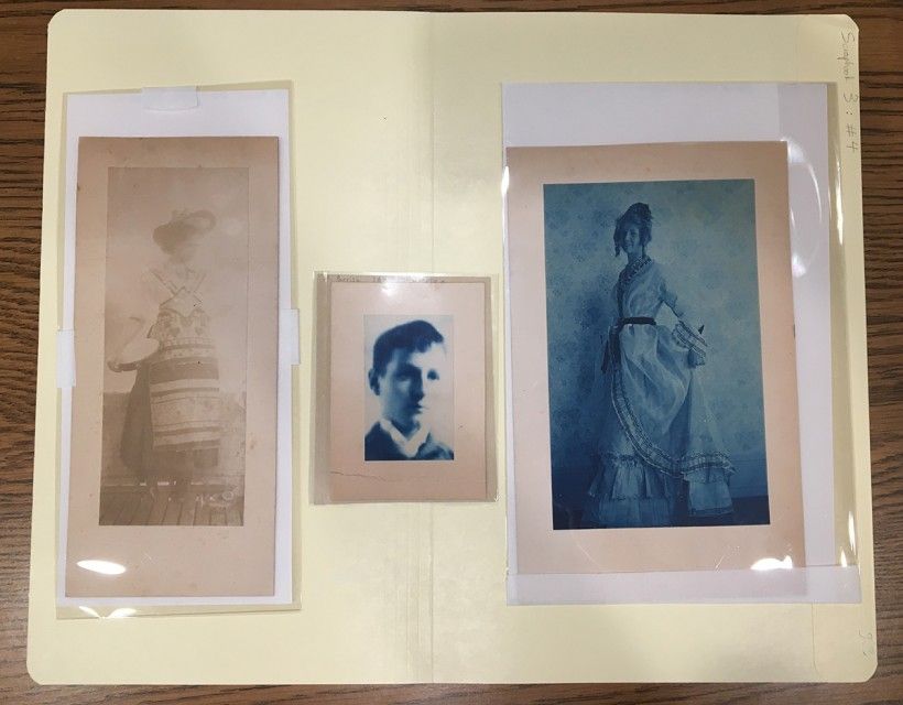 Items removed from the same page and now in protective sleeves, backed by acid-free paper, and placed in a labeled archival folder. Items removed from the same page and now in protective sleeves, backed by acid-free paper, and placed in a labeled archival folder.