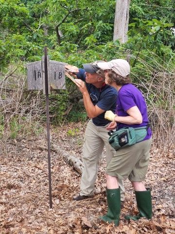 Pennsylvania Master Naturalist, Elizabeth Good, and her husband Mark Weakland check bluebird boxes at Penguin Court in 2022.