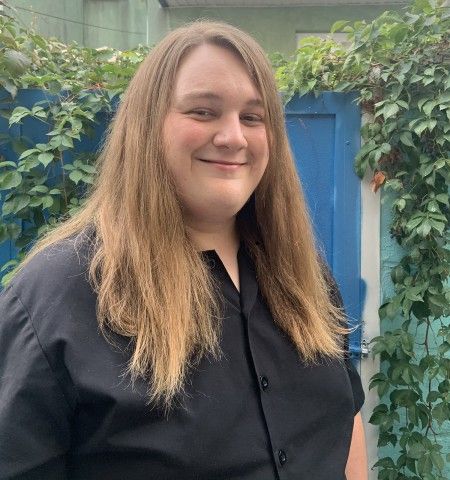 A person smiling for the camera