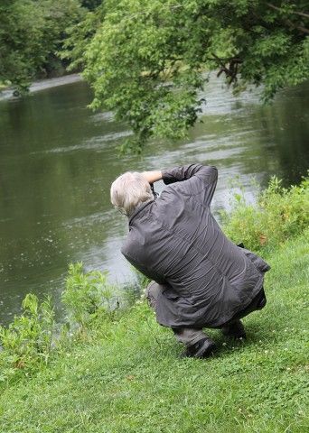 Photographing on river bank