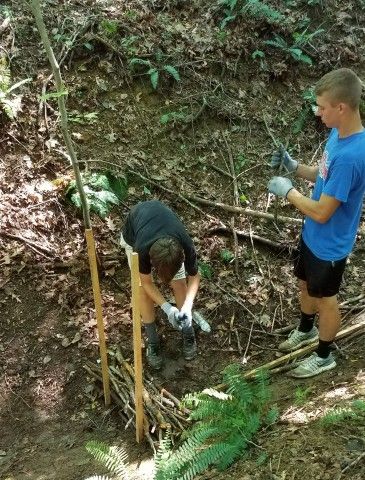 Potter Baseball Team working at the Laurels Preserve