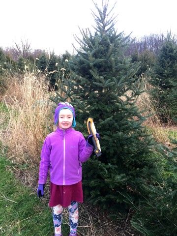 girl with christmas tree