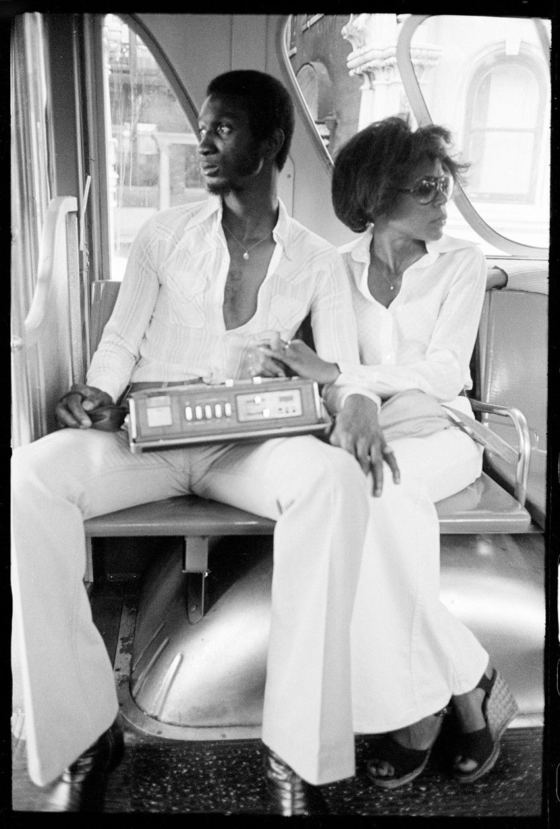 Frank Stewart, Radio Players Series (or The Bus), 1978, gelatin silver print, 14 x 11 in. Collection of Sing Lathan and Bining Taylor