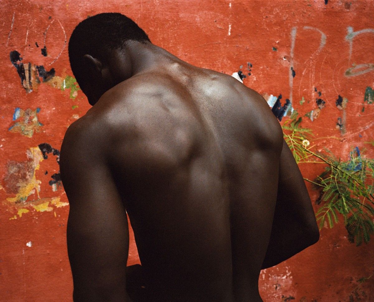 Frank Stewart, Gorée Island Painter (or Slave Castle Back), 2006, chromogenic print, 35 x 42 ½ in. Guess Family Collection, Louisville, KY