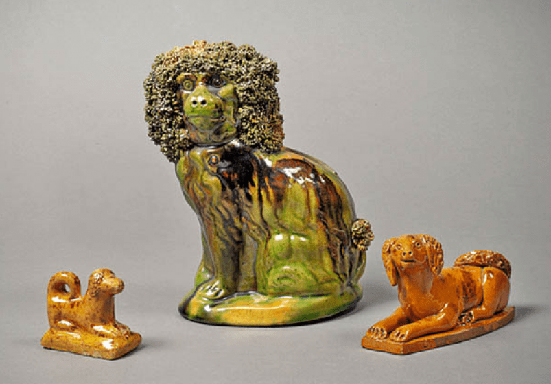 (Left to right): Dog figure, attributed to John Bell Sr., Waynesboro, Franklin County, Pennsylvania, 1833-80; dog bank, attributed to George Wagner, Lehighton, Carbon County, Pennsylvania, 1875-1900; dog figure, attributed to Jesiah Shorb, West Manheim To