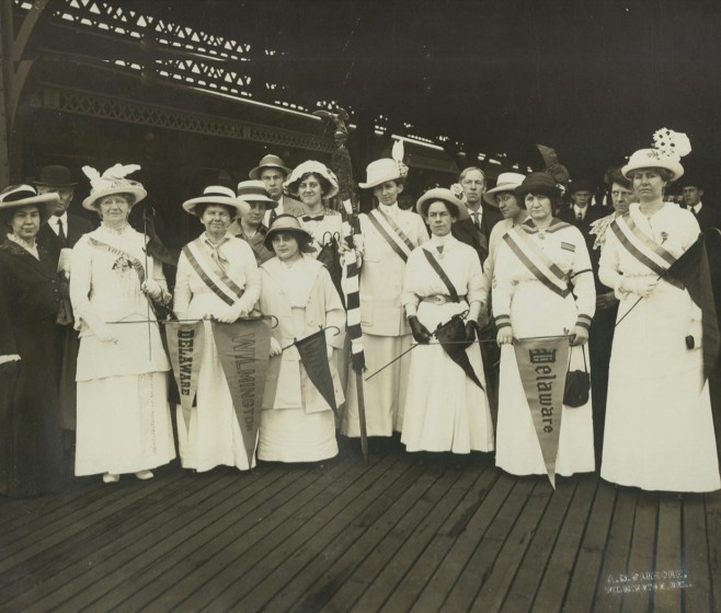 A group of women at the Wilmington train station departing for a suffrage demonstration in Washington, D. C., May 9, 1914. Courtesy of the Delaware Historical Society.